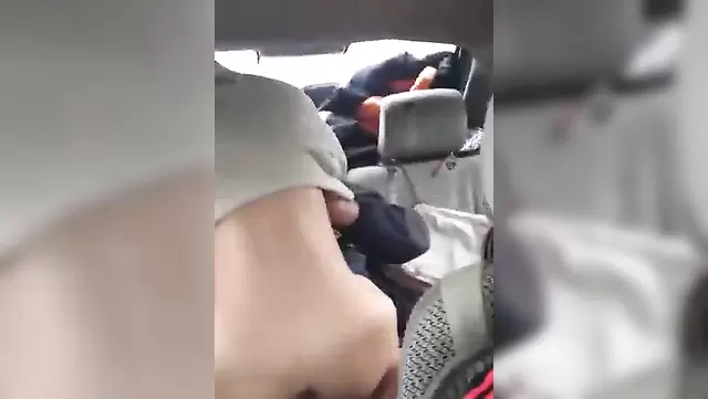 Asian girl gets fucked in a car by her friend